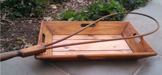 wooden tray and rug beater